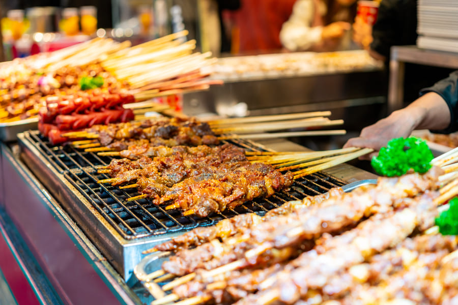 comida en callejra tipo parrilla en china
